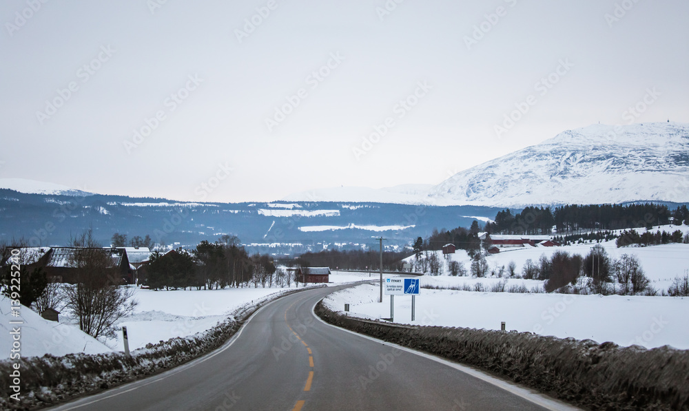 A beautiful landscape with a road in the Norwegian winter