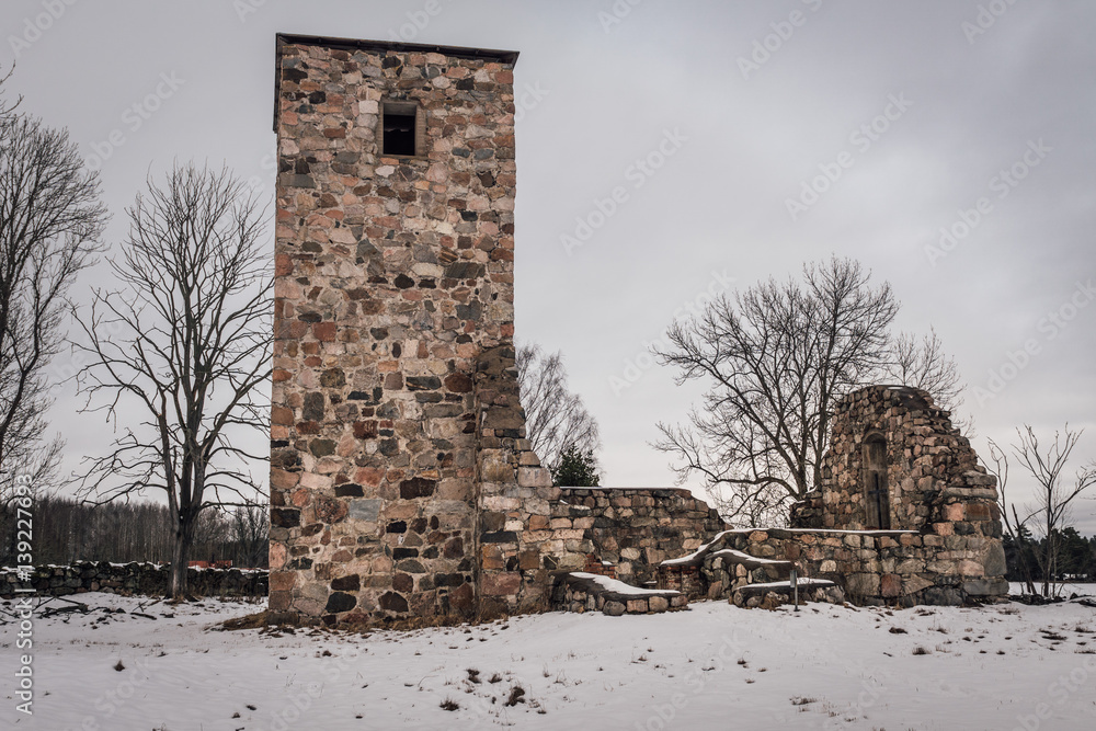 Ruin of a medieval stone church in Rytterne Sweden on a cold winter day