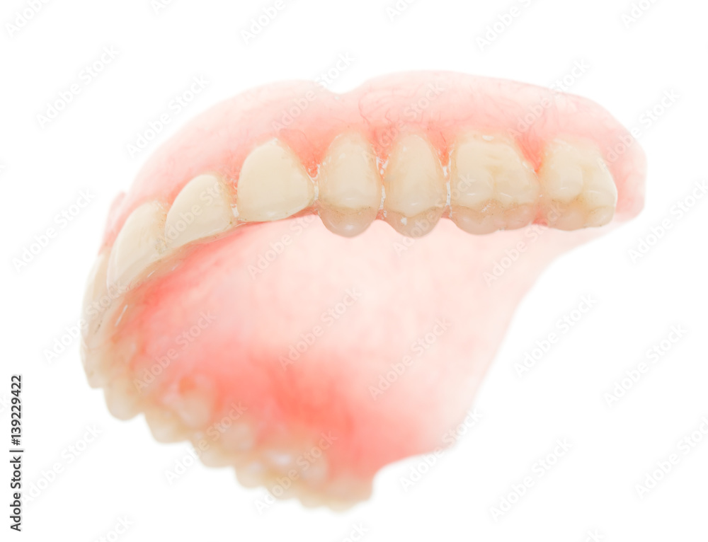 false teeth on a white background false teeth on a white background