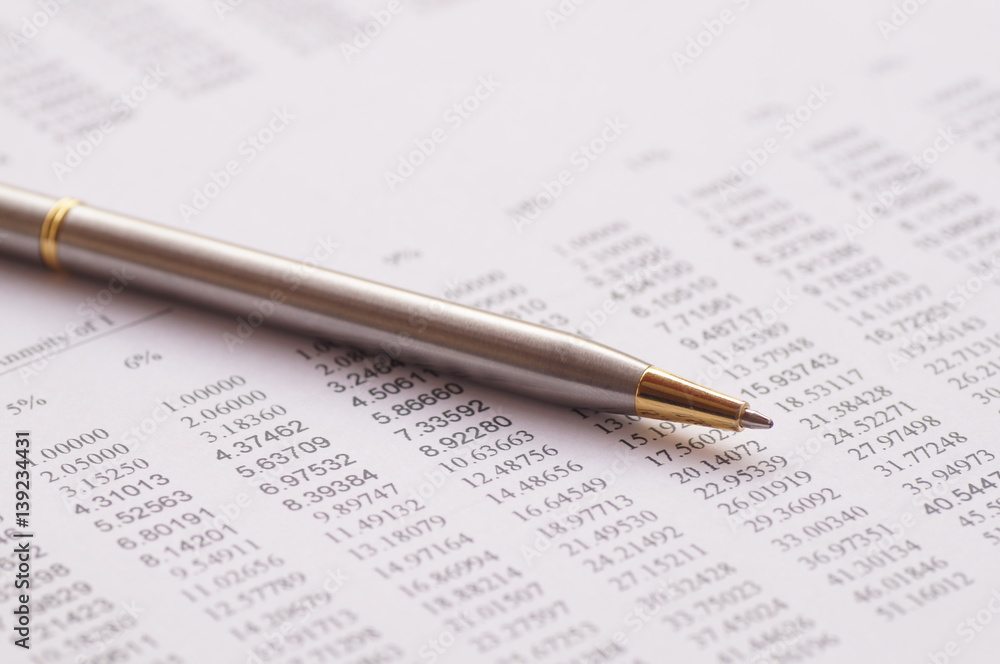 pen on paper finance, account and capital banking concept pen on paper finance, account and capital banking concept