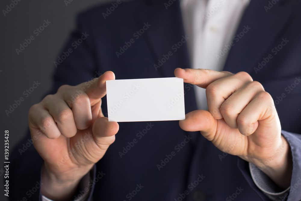 businessman holding blank visit card businessman holding blank visit card