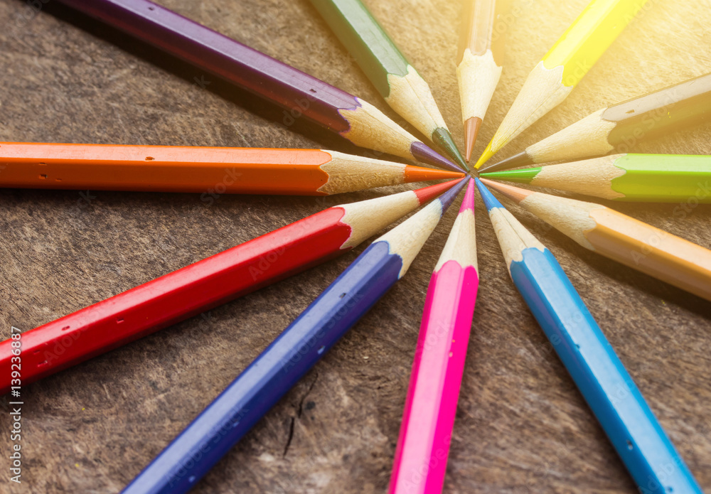 Color pencils on wood background Color pencils on wood background