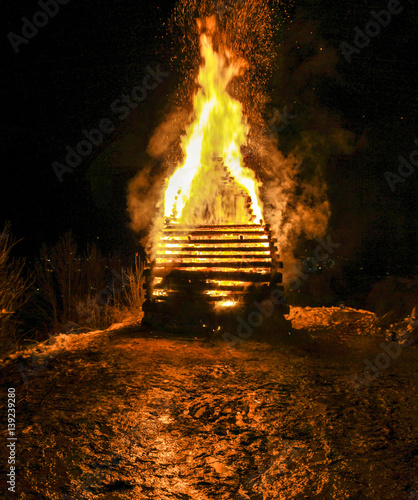 Big huge traditional fire. Burning of witches in a bonfire.
