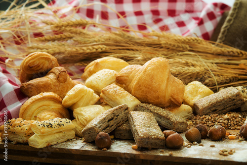 Bakery product assortment with bread loaves, buns, rolls and Danish pastries