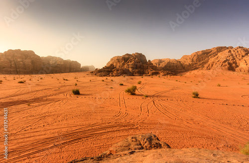 Fototapeta Naklejka Na Ścianę i Meble -  Sunrise over the desert of Wadi Rum, Jordan