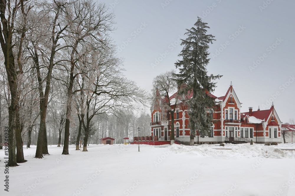 Ancient homestead in Art Nouveau style in the village Golovichpole in the winter, Grodno region, Belarus. Ancient homestead in Art Nouveau style in the village Golovichpole in the winter, Grodno region, Belarus.