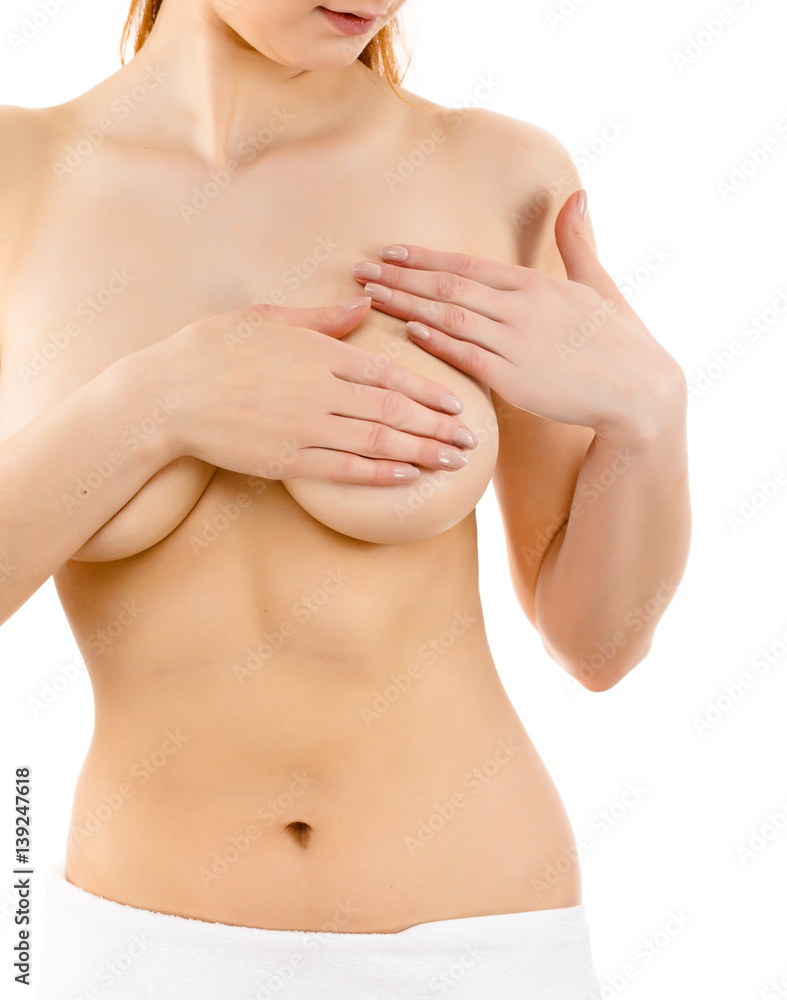 Woman examining her breast isolated on white background Stock Photo