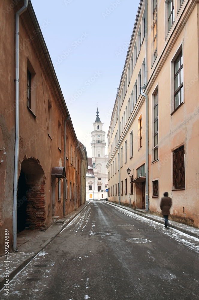 Old narrow street of Kaunas, the city museum in the Baroque style in perspective. Lithuania.