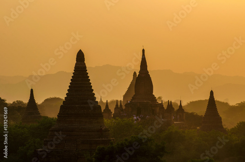 silhouette of tourist waiting for sunset on Pagoda in Bagan, Myanmar