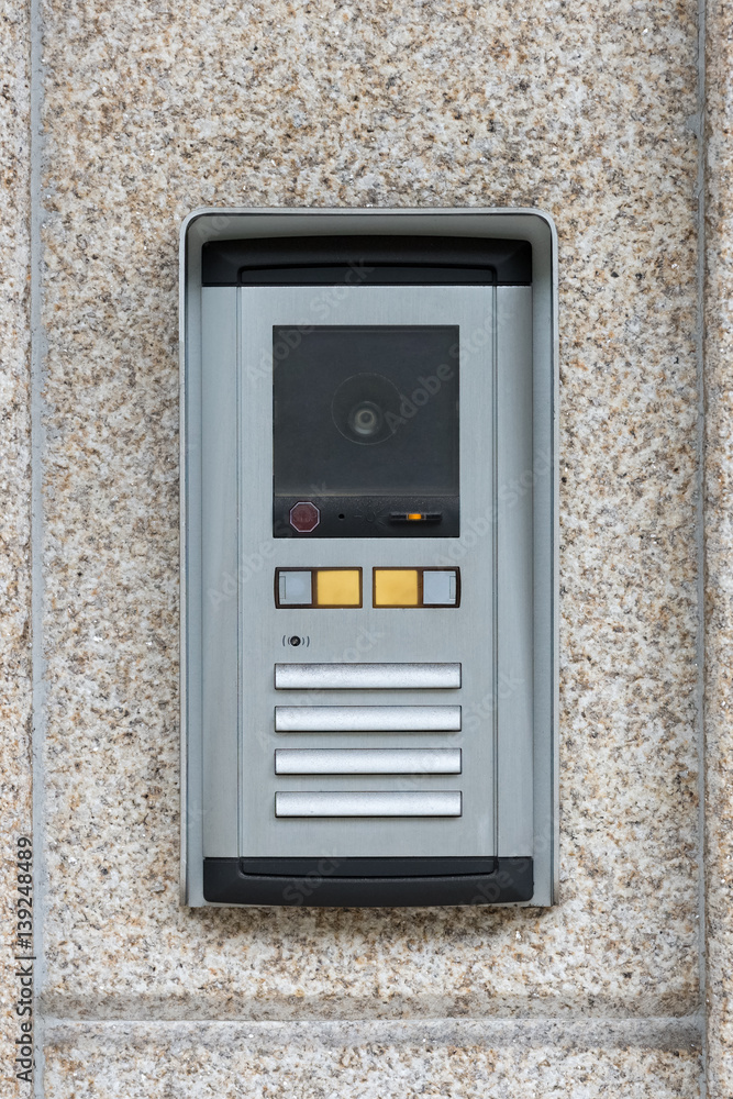 intercom on the background of a granite wall intercom on the background of a granite wall