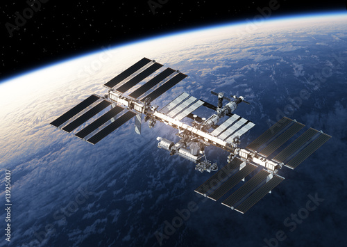 Fototapeta Naklejka Na Ścianę i Meble -  International Space Station Orbiting Earth
