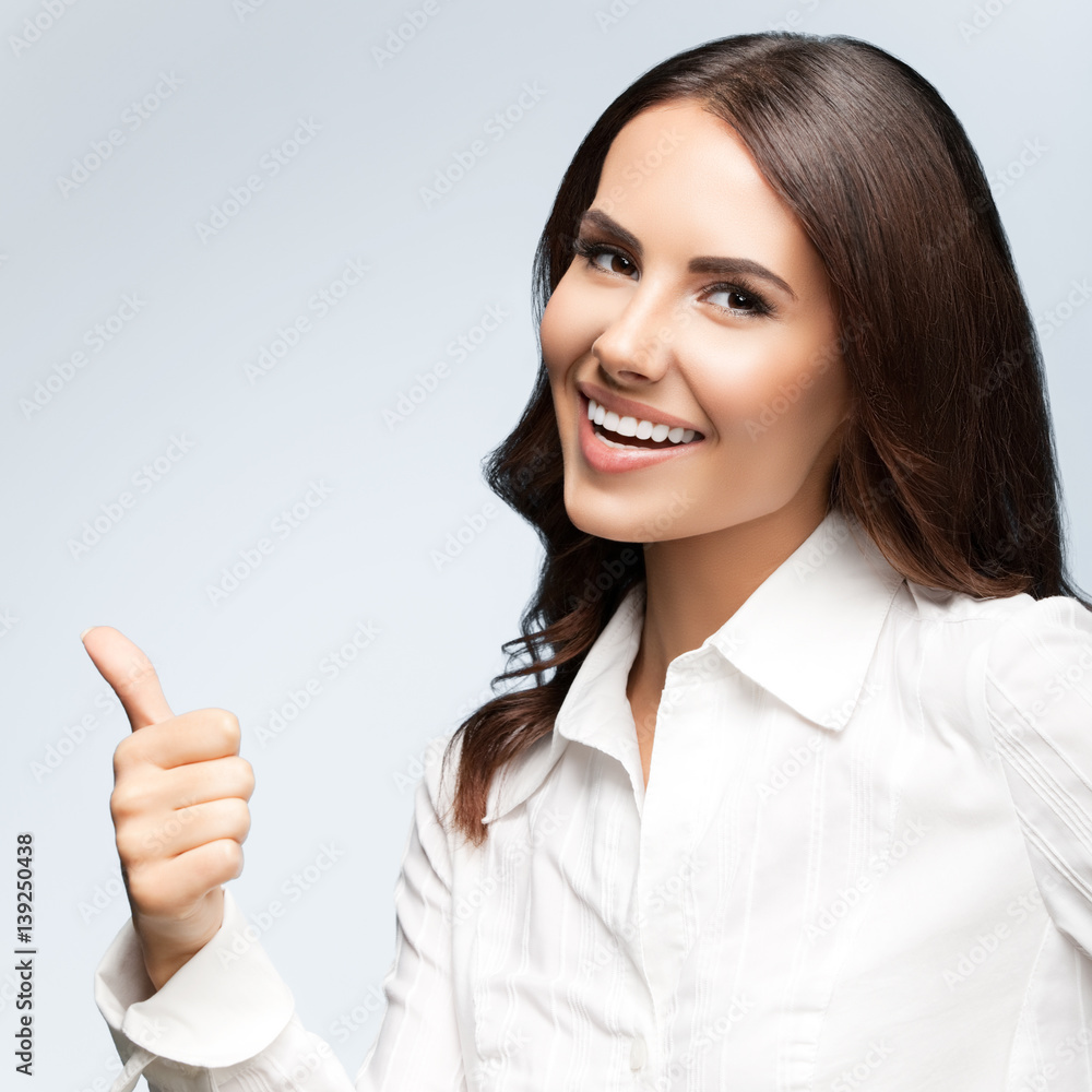 businesswoman, showing thumb up gesture businesswoman, showing thumb up gesture