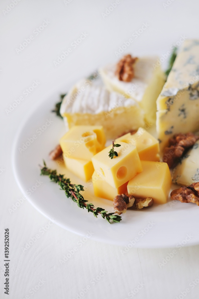 Cheese plate with different kinds of cheese Cheese plate with different kinds of cheese