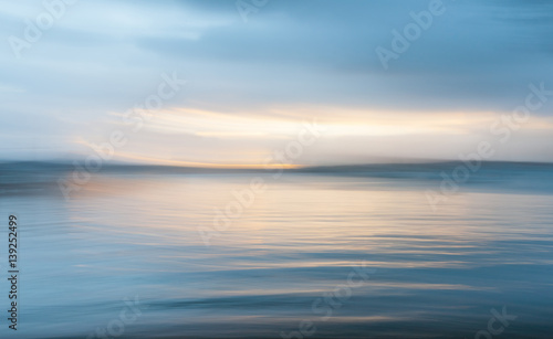 Mystical motion blur background at sunset over the bay Russell  New Zealand.