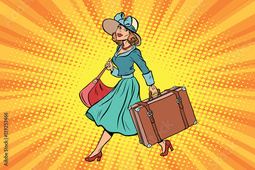 retro traveler girl with a suitcase