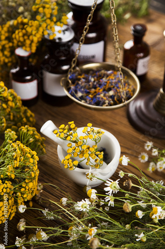 Herbal medicine on wooden desk background