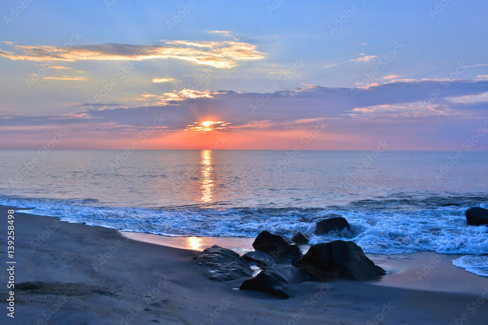 Fototapeta premium Sunrise at the Shore on a Summer Morning