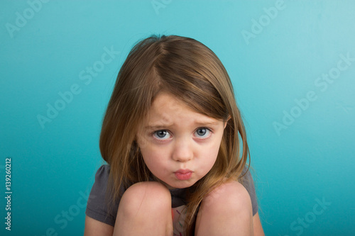 Little girl pouting photo