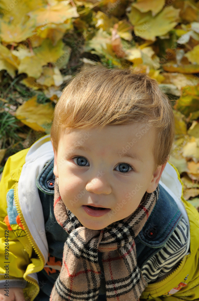 Portrait of a boy with a scarf around his neck Portrait of a boy with a scarf around his neck