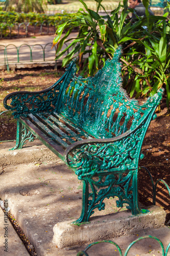 Photography Retro bench in the park of old Havana, Cuba