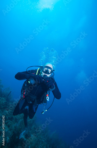 Photography Happy young scuba diver