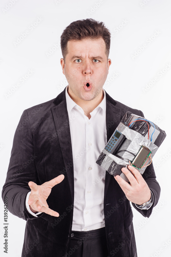 man holding time bomb in his hands. terrorism and dangerous life concept man holding time bomb in his hands. terrorism and dangerous life concept