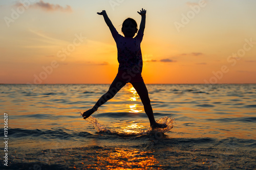 Happy little girl having fun