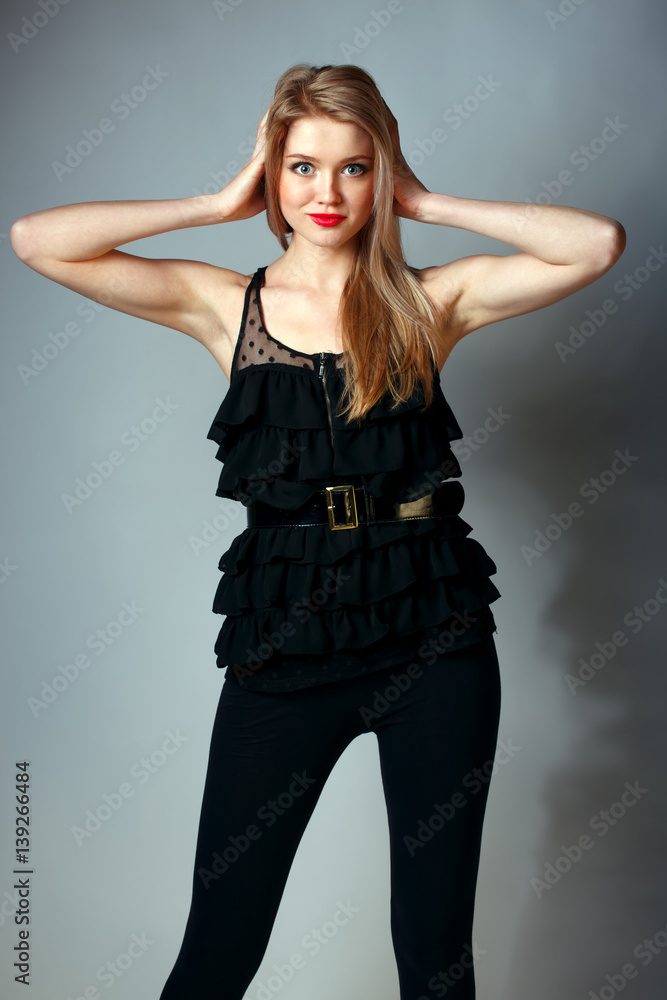 Fototapeta premium Beautiful young model posing in the studio.