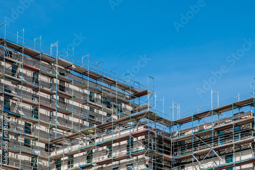 building construction site with scaffolding