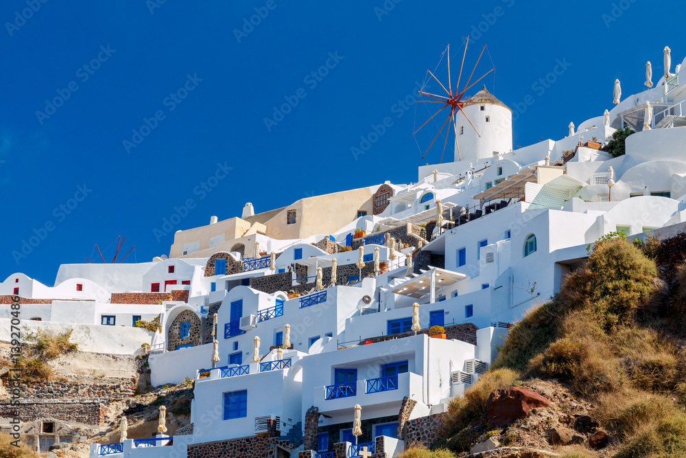 Oia. The village with white houses and windmills.