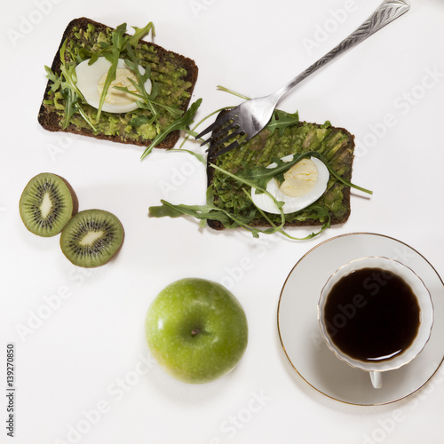 The ideal breakfast for the proper energy for the full day. Coffee with milk, orange juice, fruit . photo