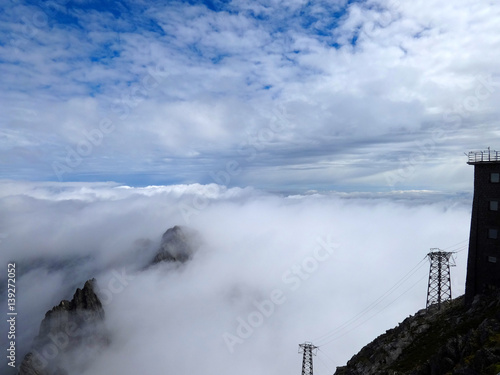 View of clouds and mountains from Lomnicky peak, Slovakia
