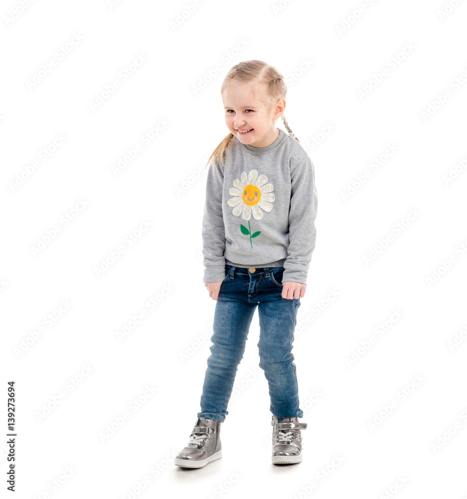 Little blonde child smiling awkwardly, isolated Little blonde child smiling awkwardly, isolated
