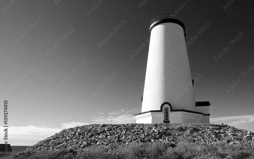 Lighthouse at Piedras Blancas point on the Central California Coast north of San Simeon California USA - black and white