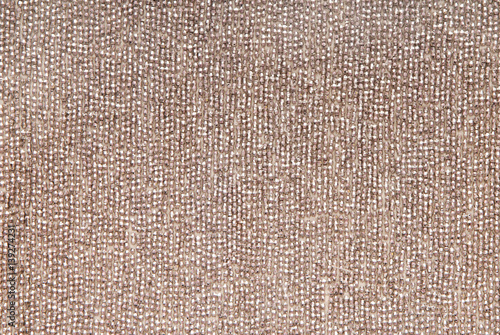 creative background, golden fabric with beads