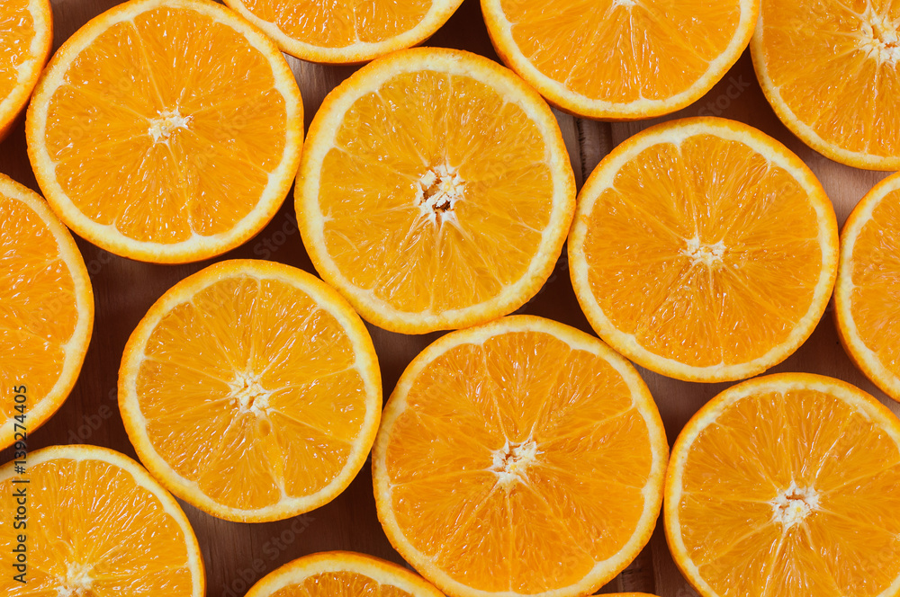 Sliced oranges as a background. Sliced oranges as a background.