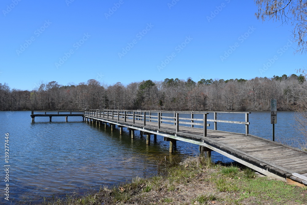 Wood pier on the lake in Wall Doxey State Park, Mississippi