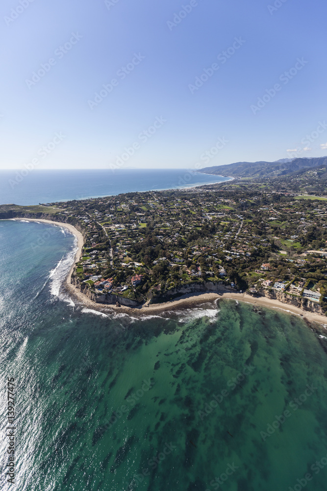 Aerial view of Point Dume and clear Pacific Ocean water in Malibu, California.  