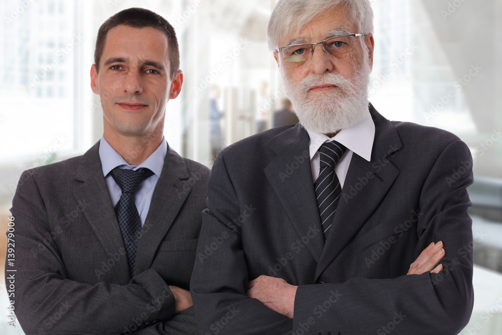 Family business,team work, success. Portrait of Young and senior businessman, lawyer, architect. two generations concept, father and son Family business,team work, success. Portrait of Young and senior businessman, lawyer, architect. two generations concept, father and son