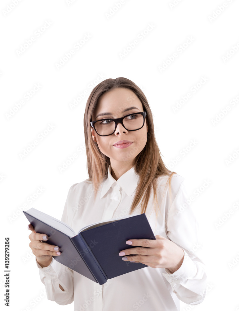 Smiling woman in glasses reading a book, isolated Smiling woman in glasses reading a book, isolated
