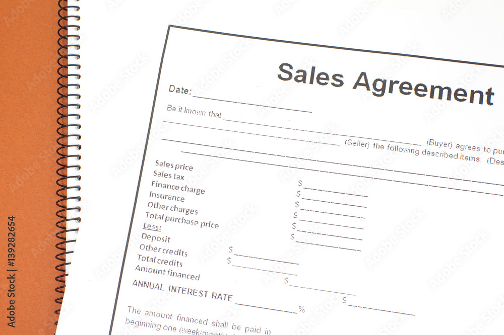 Close - up Business document paper of Sales agreement Close - up Business document paper of Sales agreement
