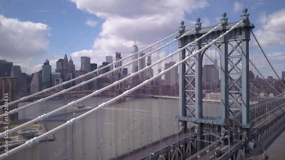 sunny flying right away from Manhattan Bridge with downtown Manhattan skyline in background sunny flying right away from Manhattan Bridge with downtown Manhattan skyline in background
