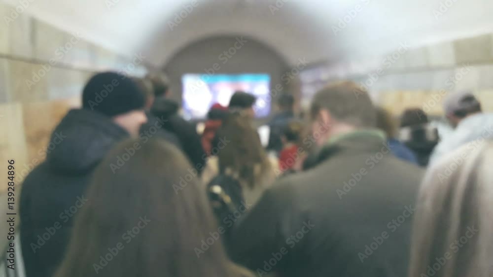 Crowd of people in subway, hand held, blurred background Crowd of people in subway, hand held, blurred background