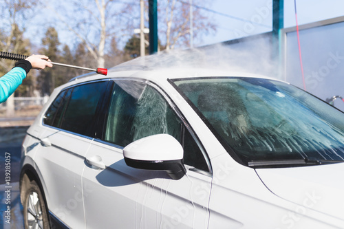 Car washing. Cleaning Car Using High Pressure Water. 