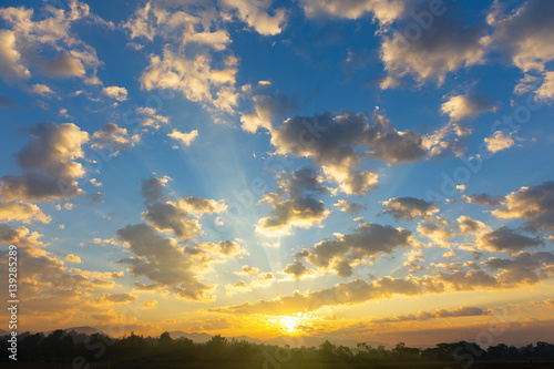 Dramatic sky include cloud  sunset or sunrise  outdoor space and horizon or skyline. Colorful  with yellow  orange and blue color at evening in autumn. For scene  backdrop  background and wallpaper.