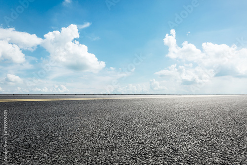 asphalt road under the blue sky © ABCDstock