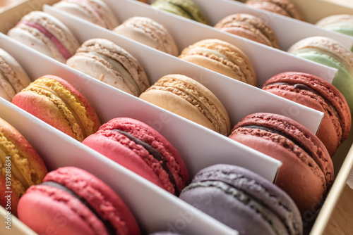 soft focus of assorted macaron in paper box