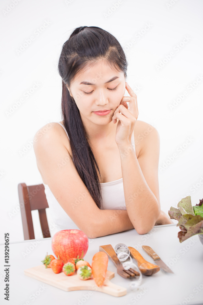 portrait of asian young woman preferring food portrait of asian young woman preferring food