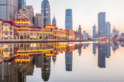 Fotografía River And Modern Buildings Against Sky in Tianjin,China.