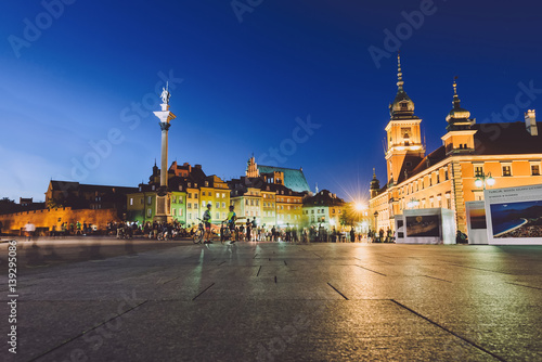 Warsaw, Poland - September 15th, 2016. Warsaw old town with night illumination by autumn. The Royal Castle square, Barbican and Sigismund's Column called Kolumna Zygmunta.